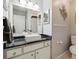 Modern bathroom with vessel sink, updated vanity and stylish mirror at 4549 Tippecanoe Trl # 20, Sarasota, FL 34233