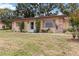 Inviting one-story home featuring a well-maintained front yard and welcoming entrance at 4549 Tippecanoe Trl # 20, Sarasota, FL 34233