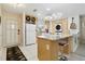 Bright and updated kitchen with granite countertops, island seating, and modern appliances at 4549 Tippecanoe Trl # 20, Sarasota, FL 34233