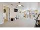 Open concept floor plan with tv, living and dining area at 4549 Tippecanoe Trl # 20, Sarasota, FL 34233