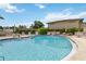 The community pool with ample seating and clear water, perfect for relaxation and recreation at 4549 Tippecanoe Trl # 20, Sarasota, FL 34233