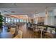 Elegant restaurant interior featuring a bar, dining tables, and modern lighting at 6504 Virginia Xing, University Park, FL 34201