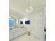 Bright bathroom features a marble topped double vanity and modern lighting at 4309 W Beachway Dr, Tampa, FL 33609