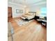 Spacious bedroom featuring hardwood floors, ample natural light, and modern decor at 4309 W Beachway Dr, Tampa, FL 33609