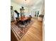 Elegant dining room showcasing a wooden table with seating for six and hardwood flooring at 4309 W Beachway Dr, Tampa, FL 33609