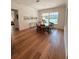 Elegant dining room featuring hardwood floors, a chandelier, and large windows at 4309 W Beachway Dr, Tampa, FL 33609