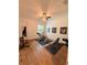 Bright exercise room with workout equipment, wood floors, and natural light at 4309 W Beachway Dr, Tampa, FL 33609
