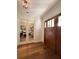 Welcoming foyer showcasing hardwood floors and a glimpse into a stylish living space at 4309 W Beachway Dr, Tampa, FL 33609