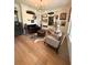 Bright living room with unique decor, hardwood floors, and comfortable seating at 4309 W Beachway Dr, Tampa, FL 33609
