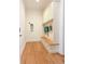 Well-organized mud room featuring a built-in bench with storage and upper cabinets at 4309 W Beachway Dr, Tampa, FL 33609