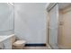 Clean bathroom featuring updated vanity and tiled shower at 11239 Cedar Hollow Ln, Tampa, FL 33618