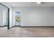 Spacious bedroom with hard wood floors, large window and mirrored closet at 11239 Cedar Hollow Ln, Tampa, FL 33618