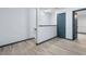 Hallway with wood-look floors and modern trim details at 11239 Cedar Hollow Ln, Tampa, FL 33618