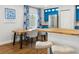 Dining area featuring a wood table with view of bright blue kitchen at 265 Seahorse Se Dr # B, St Petersburg, FL 33705