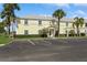 Charming yellow condo with well-manicured landscaping and ample parking at 265 Seahorse Se Dr # B, St Petersburg, FL 33705