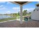 This inviting patio offers views of the lake, with comfortable seating for relaxing outdoors at 265 Seahorse Se Dr # B, St Petersburg, FL 33705
