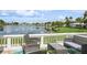 Enjoy this private patio that offers water views and stylish outdoor seating at 265 Seahorse Se Dr # B, St Petersburg, FL 33705