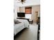 Bedroom featuring light pink walls, carpet, and a TV at 9221 Mountain Magnolia Dr, Riverview, FL 33578