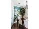 Formal dining room with decorative mural, elegant chandelier, and hardwood floors at 9221 Mountain Magnolia Dr, Riverview, FL 33578