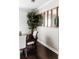 Dining room features hardwood floors, large windows, and simple decor at 9221 Mountain Magnolia Dr, Riverview, FL 33578