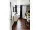 Chic dining area with dark wood flooring and a marble table, flooded with natural light at 9221 Mountain Magnolia Dr, Riverview, FL 33578