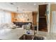 Stylish living room featuring neutral tones, plush seating, and granite countertops, ideal for relaxation and socializing at 9221 Mountain Magnolia Dr, Riverview, FL 33578