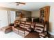 Relaxing living room with a large sectional sofa and entertainment center at 9221 Mountain Magnolia Dr, Riverview, FL 33578