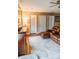Cozy living room featuring a plush sofa, modern entertainment center, and soft neutral tones at 9221 Mountain Magnolia Dr, Riverview, FL 33578