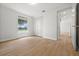 Bright bedroom with closet, and wood-look floors at 2126 Hanby St, Port Charlotte, FL 33952