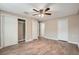 Bedroom features new wood flooring and large closet at 5429 Flora Ave, Holiday, FL 34690