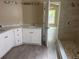 Bathroom featuring a double sink vanity, and updated shower with tile surround at 12421 Early Run Ln, Riverview, FL 33578