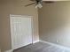 Bedroom with a large closet and neutral colored walls at 12421 Early Run Ln, Riverview, FL 33578