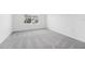 Cozy bedroom with window allowing in natural light at 6158 Daerr Ridge St, Zephyrhills, FL 33542