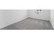 Empty bedroom featuring neutral walls, carpet flooring and one window for natural light at 6162 Daerr Ridge St, Zephyrhills, FL 33542