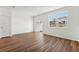 Bright living room with luxury vinyl plank flooring and a backyard view with gazebo at 6251 Daerr Ridge St, Zephyrhills, FL 33542