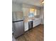 Bright kitchen with stainless steel appliances, white cabinets, and modern countertops at 845 18Th S Ave, St Petersburg, FL 33705