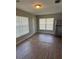 Bright open-concept living room with natural light and modern wood flooring at 845 18Th S Ave, St Petersburg, FL 33705