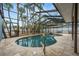 Beautiful screened-in private pool with outdoor seating, offering a refreshing and secluded retreat at 5108 Saint Albans Ave, Siesta Key, FL 34242