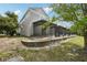 Exterior view of the home's backyard and screened-in patio at 10124 Westpark Preserve Blvd, Tampa, FL 33625