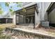 View of the screened-in patio from the backyard at 10124 Westpark Preserve Blvd, Tampa, FL 33625