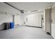 Spacious garage with ample storage cabinets and epoxy flooring at 10124 Westpark Preserve Blvd, Tampa, FL 33625