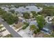Aerial view of houses in a neighborhood near the water at 135 Florida Blvd, Crystal Beach, FL 34681