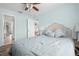 Serene bedroom with soft hues, a comfortable bed, and calming decor, creating a tranquil and restful atmosphere at 135 Florida Blvd, Crystal Beach, FL 34681