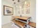 Cozy dining area with a rustic wooden table and seating at 135 Florida Blvd, Crystal Beach, FL 34681