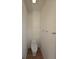 Simple and clean powder room featuring a contemporary toilet and minimalist design at 2408 Nassau St, Sarasota, FL 34231