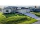 Charming one-story home featuring stone accents and a well-manicured lawn at 9257 King Hill St, Port Charlotte, FL 33981