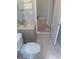 Bathroom showing toilet, sink, vanity and tile floors at 1452 Crazy Horse Dr, Lutz, FL 33559