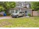 Charming home with a driveway, storage bin and ample parking space in a quiet neighborhood at 15272 Avalon Ave, Clearwater, FL 33760
