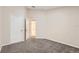 Neutral bedroom with plush carpeting with an ensuite bathroom at 26622 Castleview Way, Wesley Chapel, FL 33544