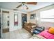This is a cozy bedroom with a closet and a sofa at 1711 E Sewaha St, Tampa, FL 33612